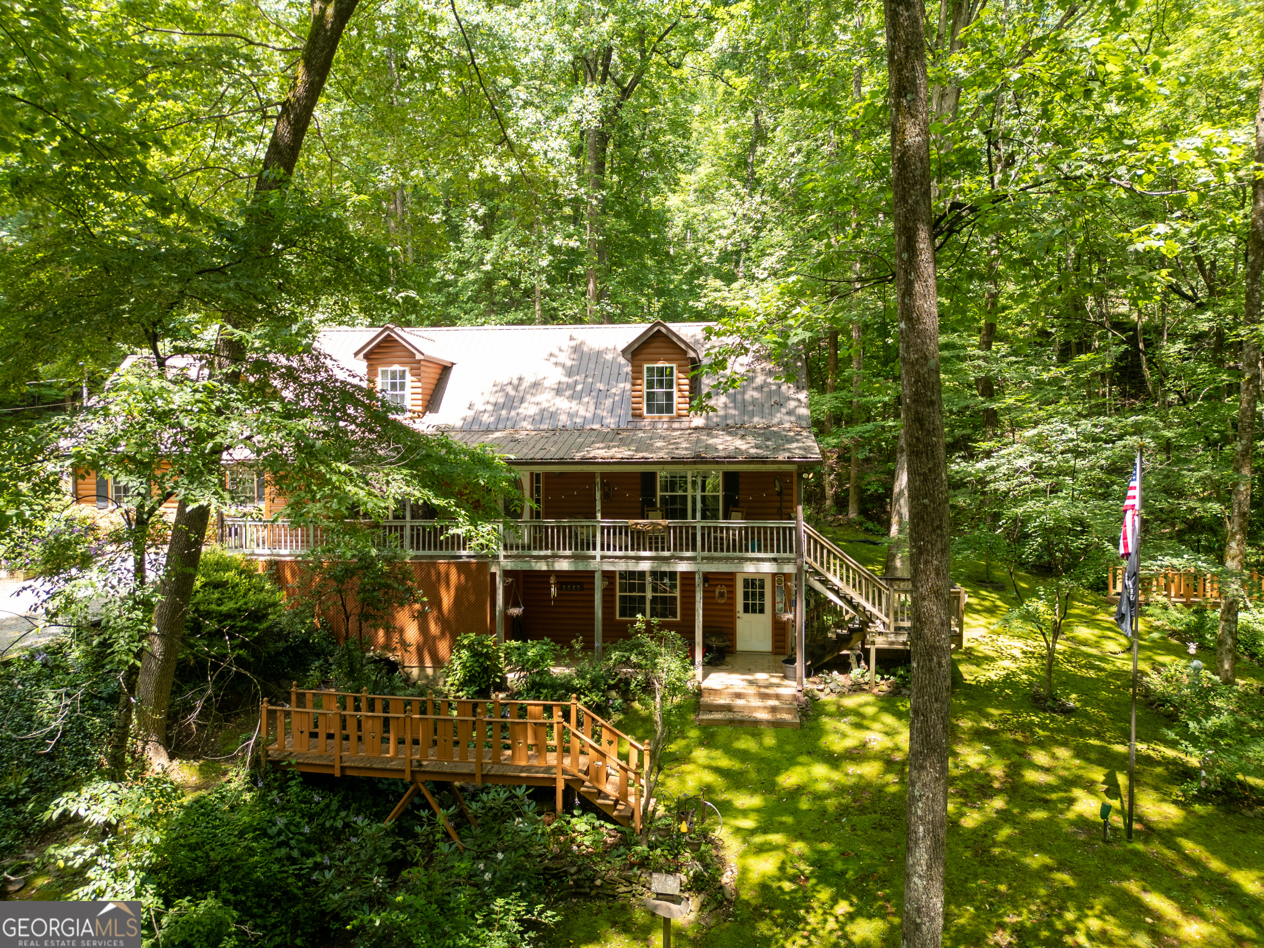 75 Juniper Trail Clayton, GA 30525 - Photo 36 of 38 a front view of a house with a garden