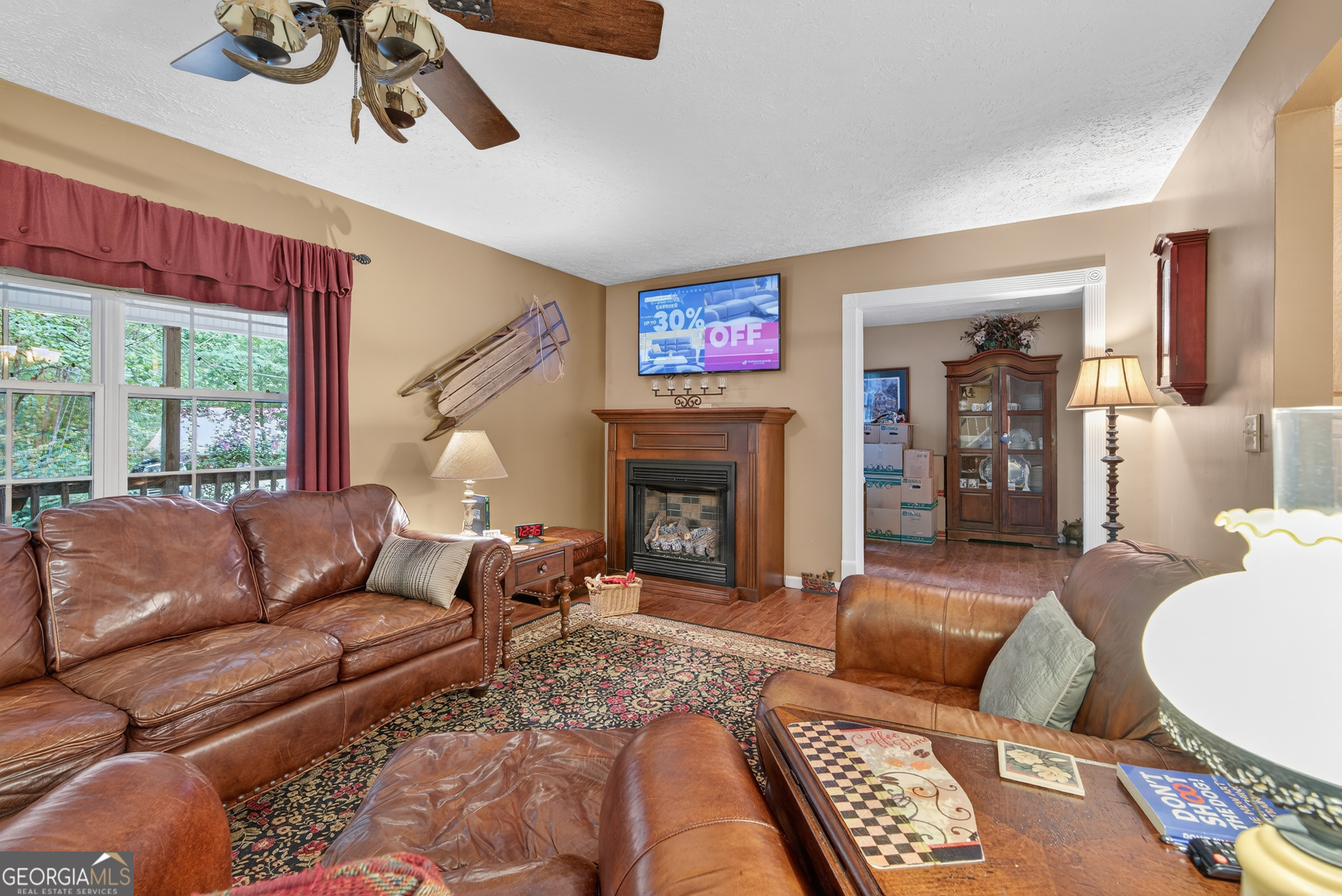 75 Juniper Trail Clayton, GA 30525 - Photo 6 of 38 a living room with furniture and a fireplace