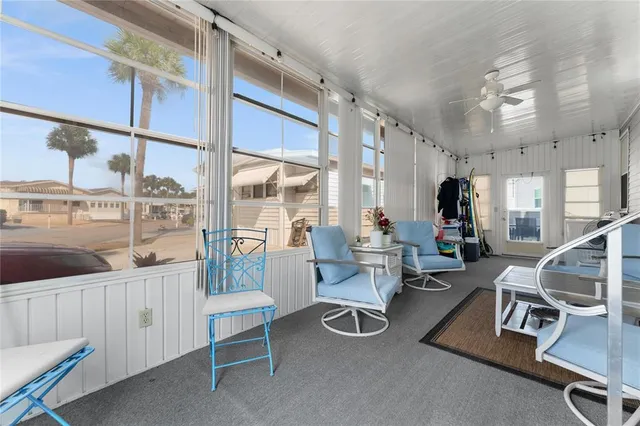 a room with gym equipment and a large window