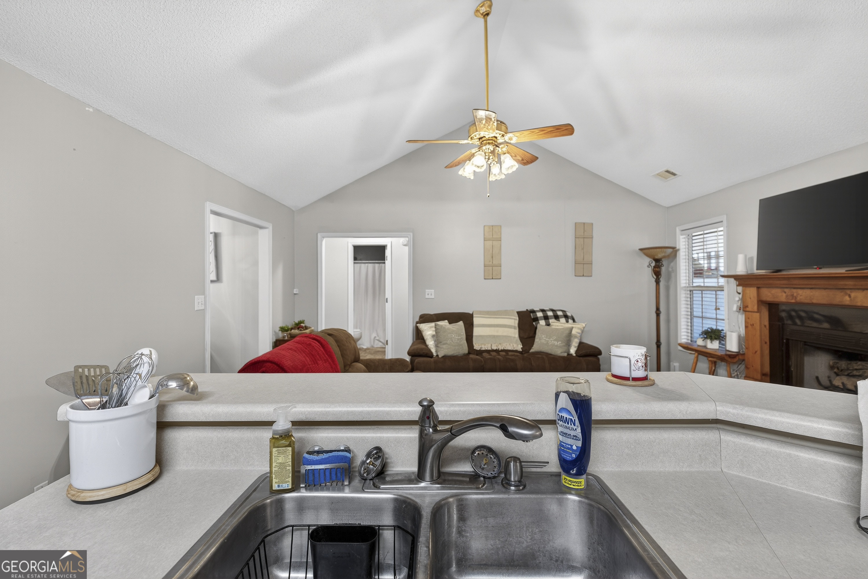 249 Southern Walk Circle Gray, GA 31032 - Photo 25 of 58 a living room with furniture and a fireplace