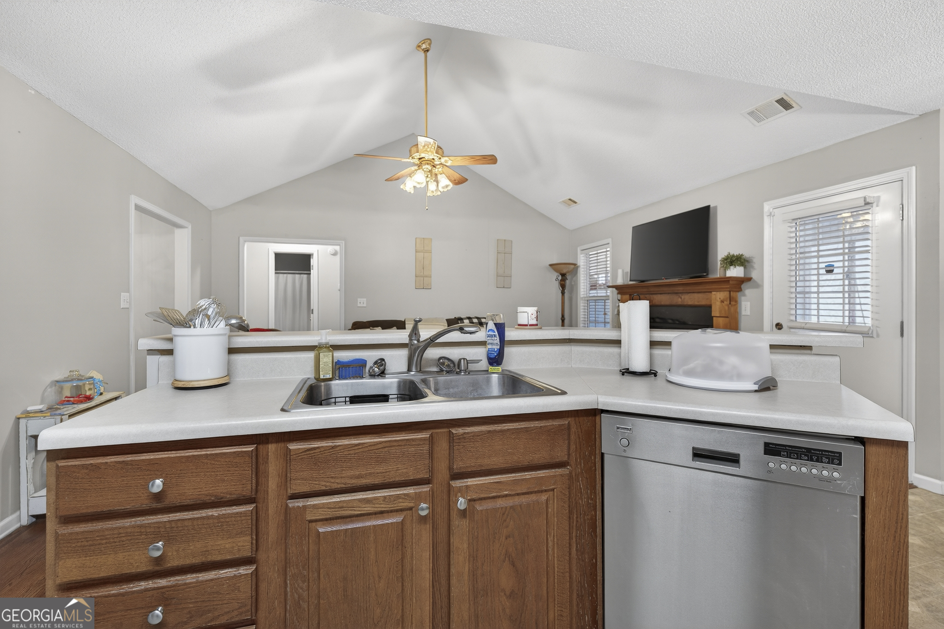 249 Southern Walk Circle Gray, GA 31032 - Photo 27 of 58 a kitchen with cabinets appliances and a sink