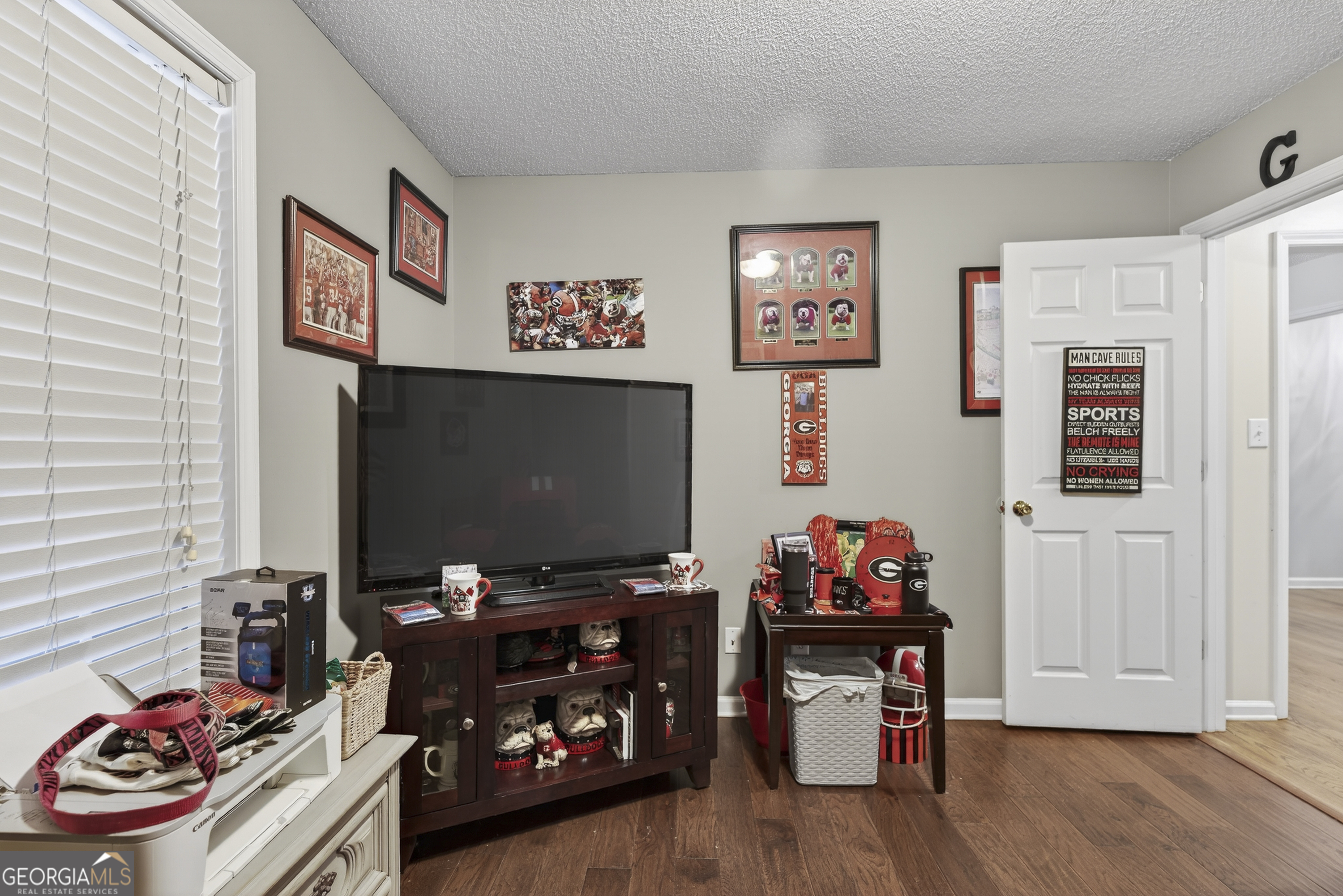 249 Southern Walk Circle Gray, GA 31032 - Photo 36 of 58 a room with furniture and wooden floor