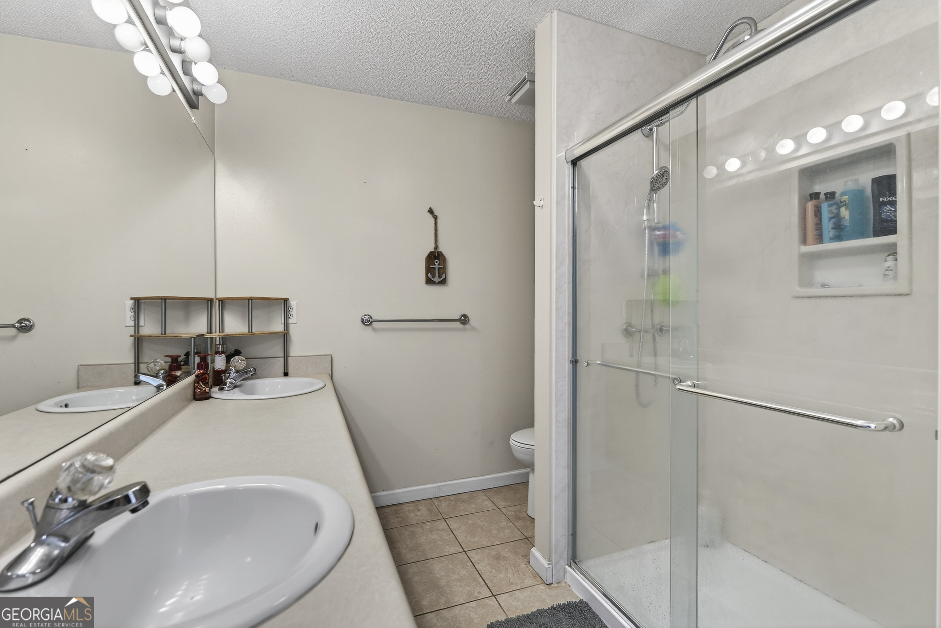 249 Southern Walk Circle Gray, GA 31032 - Photo 37 of 58 a bathroom with a sink toilet and shower