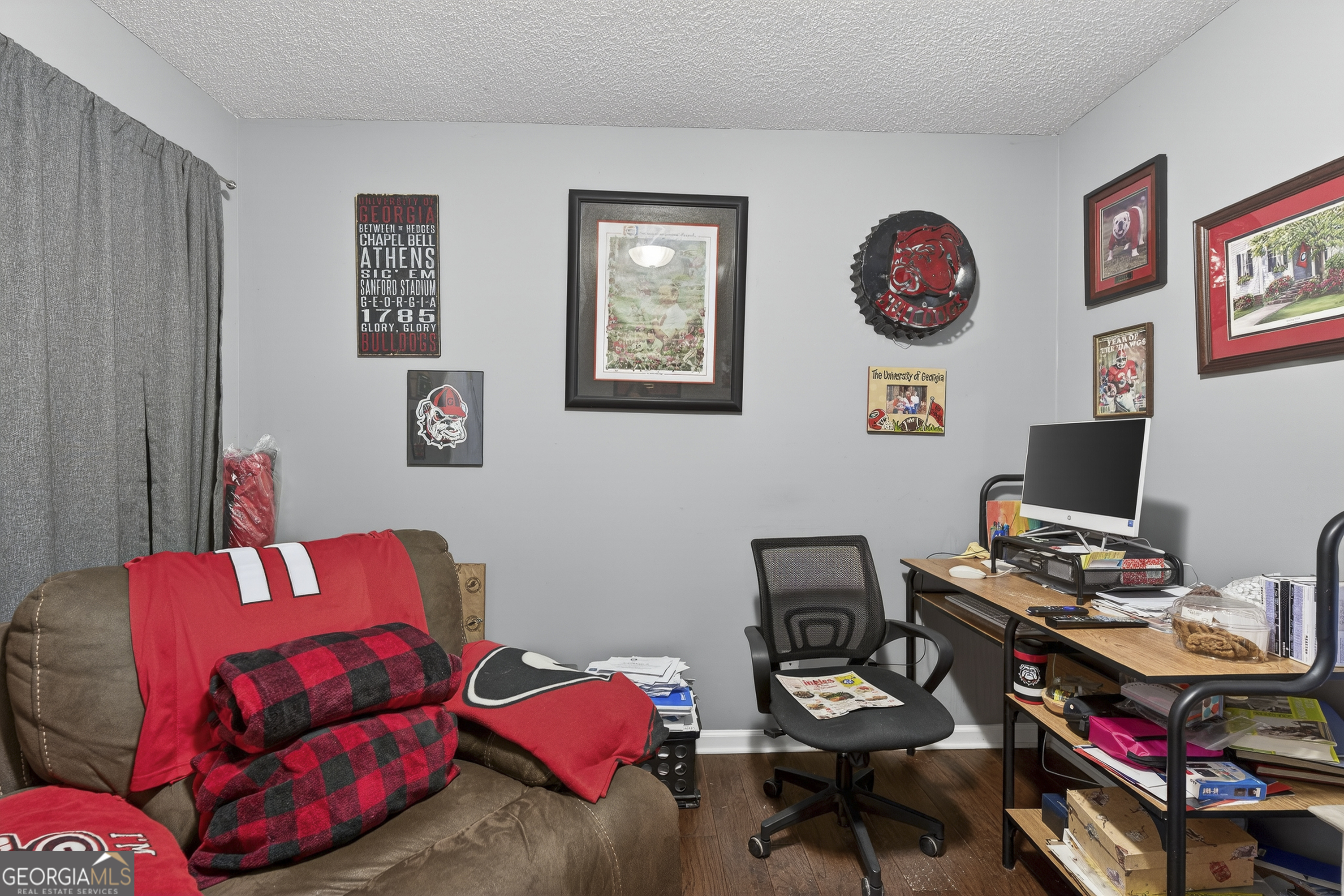 249 Southern Walk Circle Gray, GA 31032 - Photo 38 of 58 a bedroom with a bed and a chair