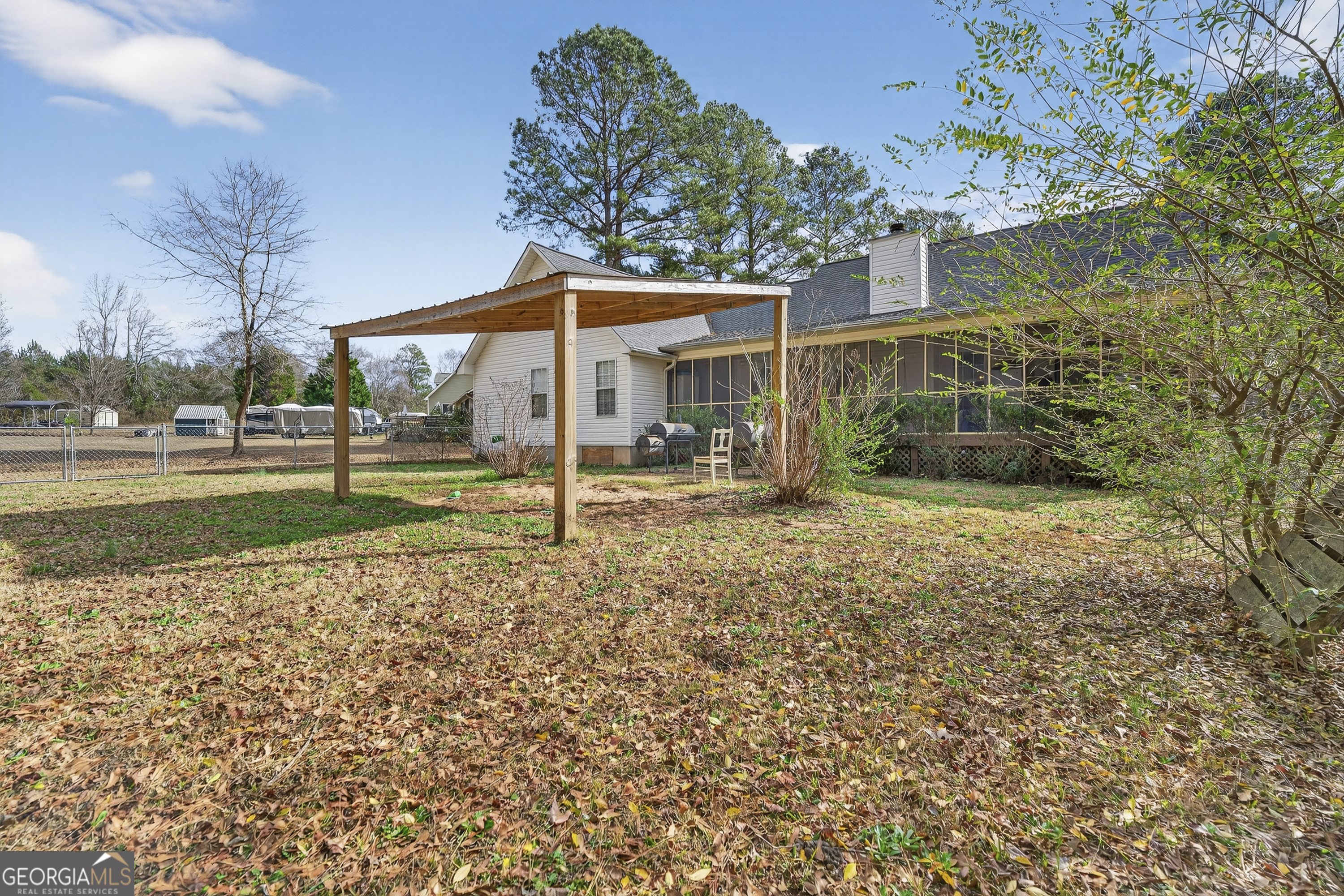 249 Southern Walk Circle Gray, GA 31032 - Photo 46 of 58 a view of a house with backyard and a tree