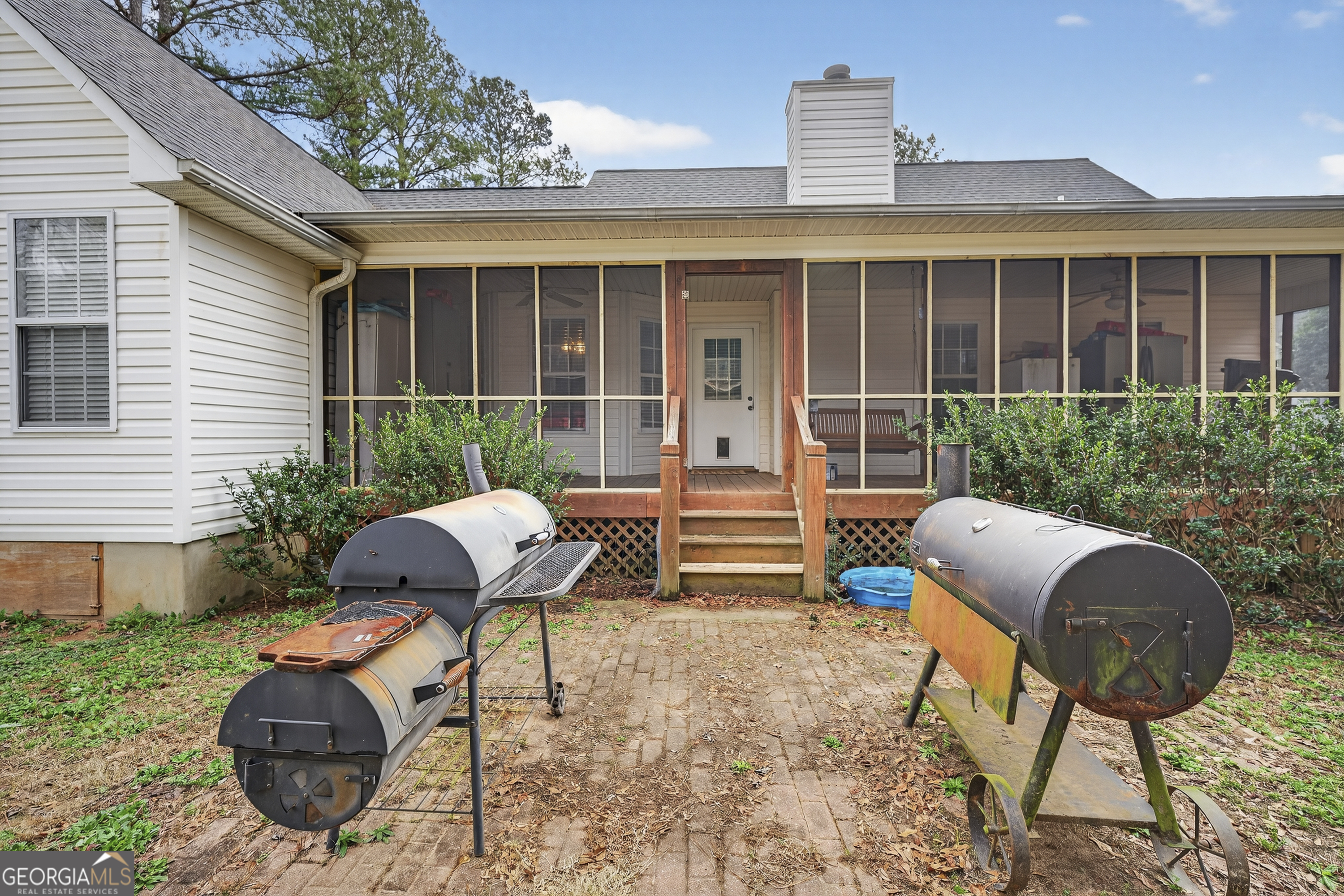 249 Southern Walk Circle Gray, GA 31032 - Photo 48 of 58 a view of a house with backyard sitting area and garden