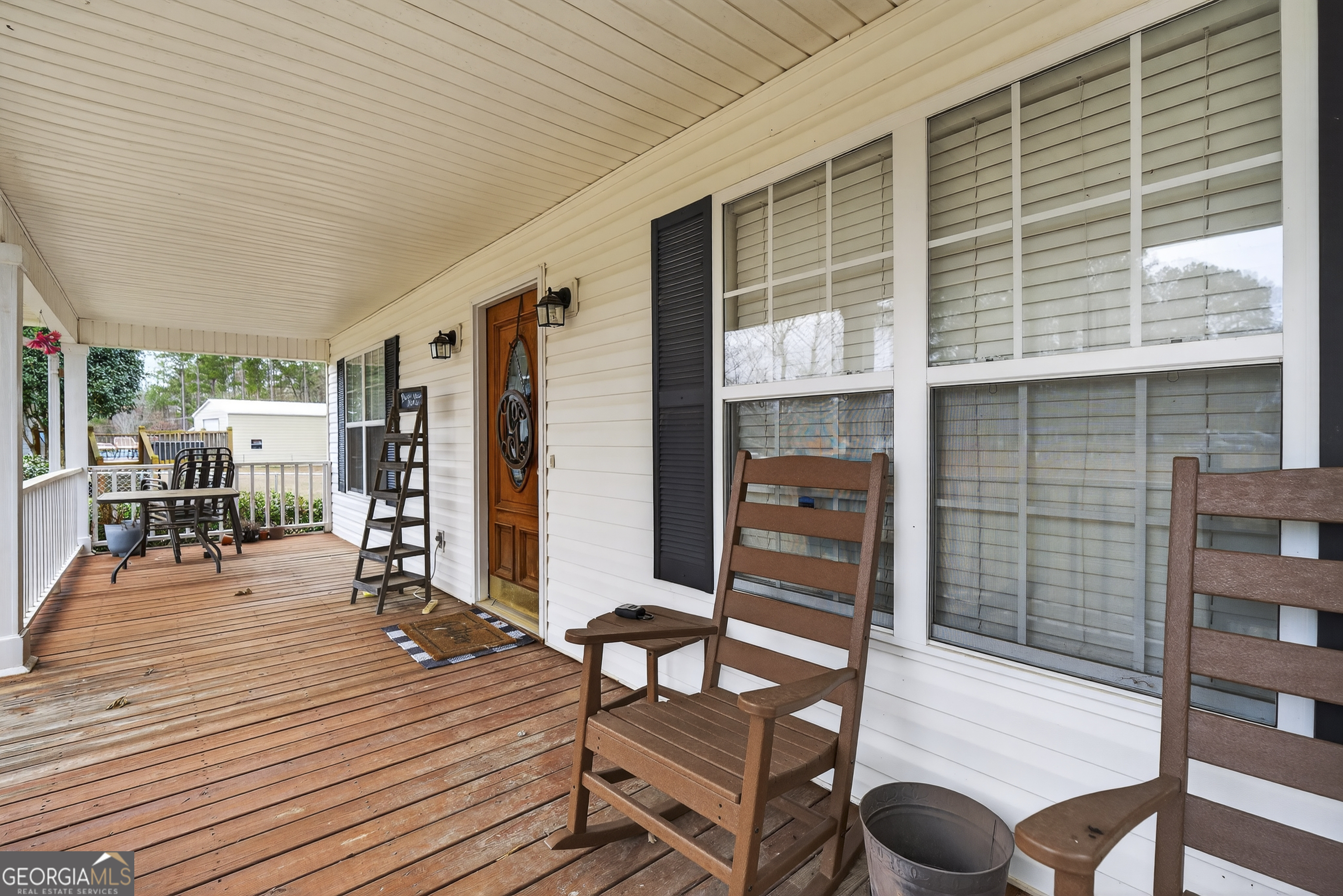 249 Southern Walk Circle Gray, GA 31032 - Photo 5 of 58 a outdoor space with lots of furniture and windows