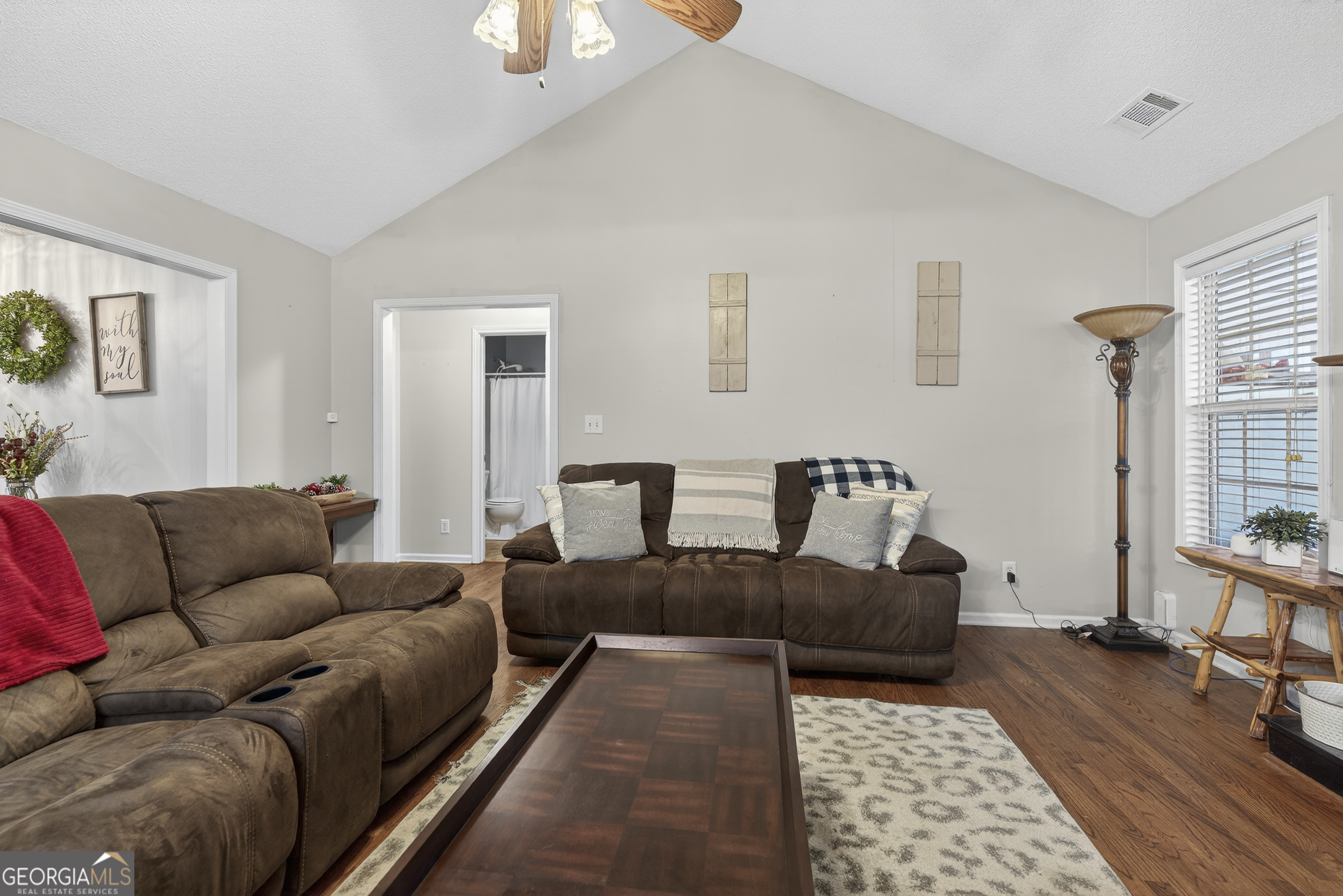 249 Southern Walk Circle Gray, GA 31032 - Photo 10 of 58 a living room with furniture and a rug