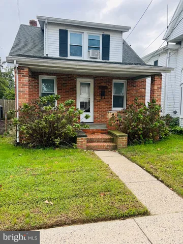 front view of house with a yard