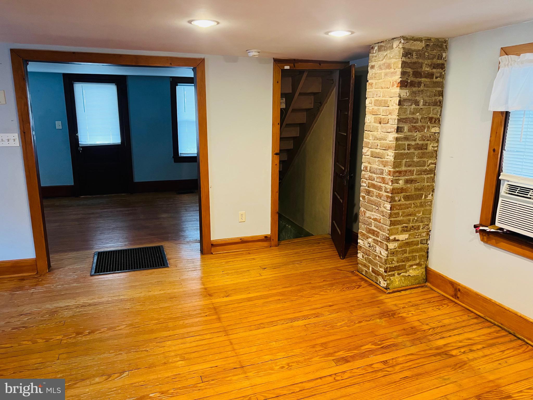 317 West Commerce Street Smyrna, DE 19977 - Photo 11 of 30 a view of entryway with wooden floor