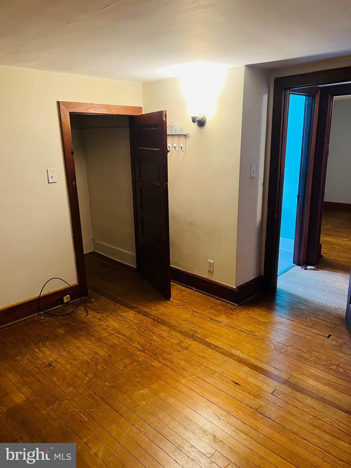 317 West Commerce Street Smyrna, DE 19977 - Photo 20 of 30 a view of an empty room with wooden floor