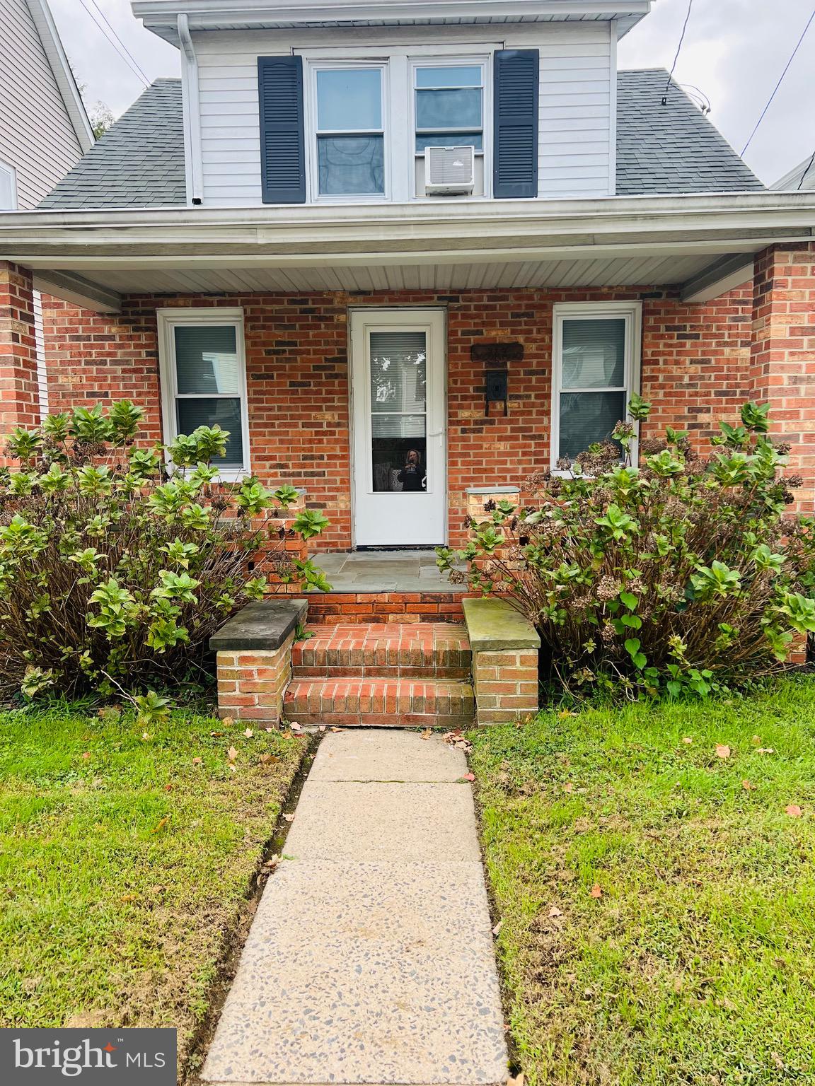 317 West Commerce Street Smyrna, DE 19977 - Photo 3 of 30 a front view of a house with garden