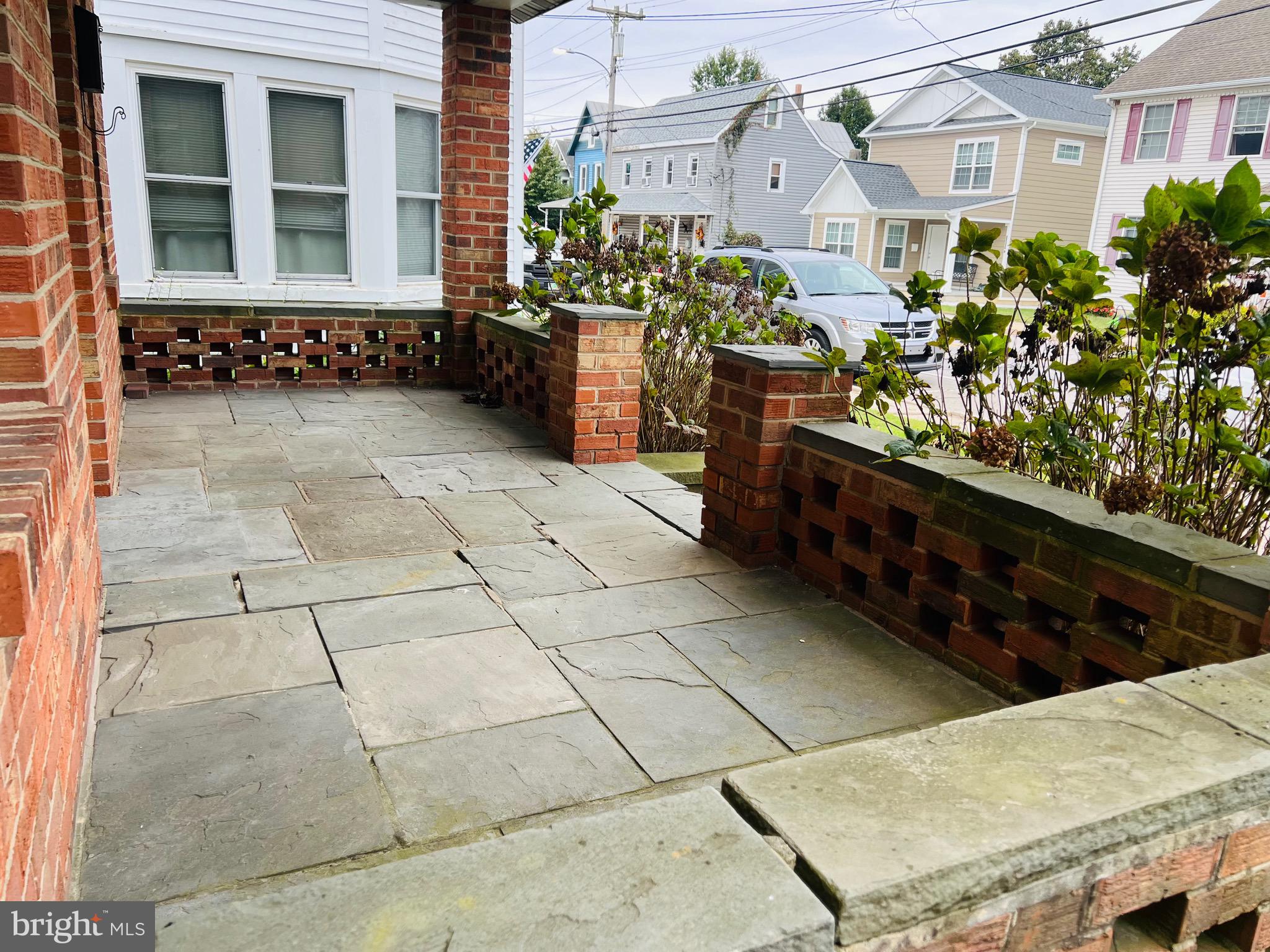 317 West Commerce Street Smyrna, DE 19977 - Photo 4 of 30 a view of a entryway door front of house