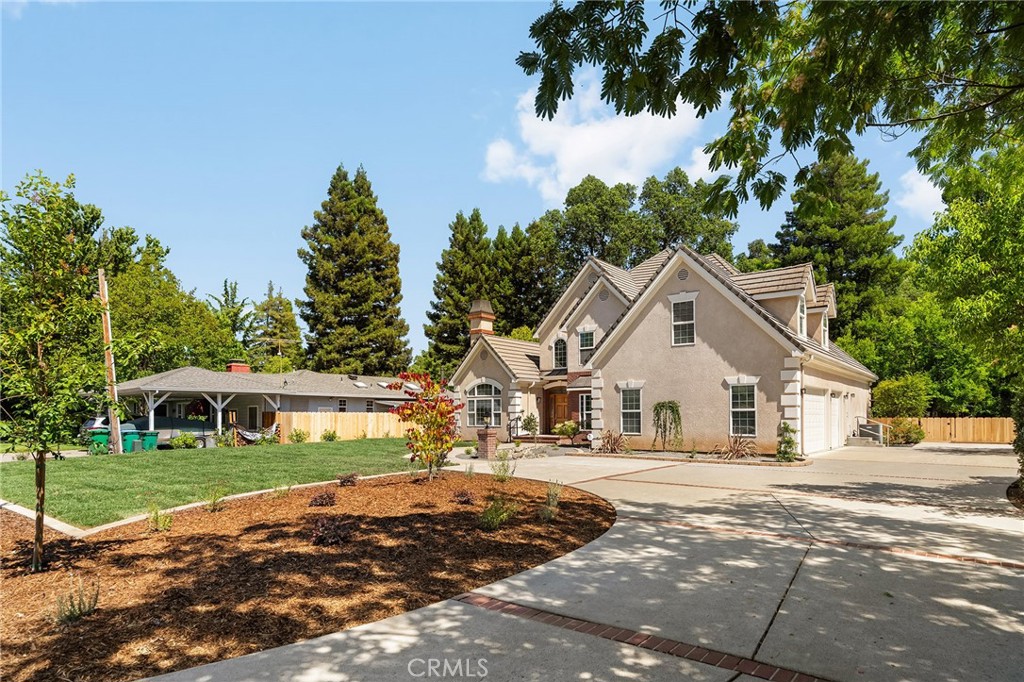 897 Filbert Avenue Chico, CA 95926 - Photo 5 of 66 a front view of a house with a yard