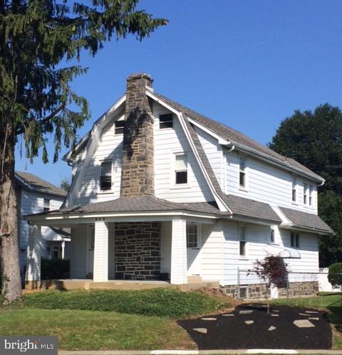 336 East Manoa Road Havertown, PA 19083 - Photo 1 of 23 a front view of a house with a yard