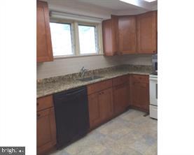 336 East Manoa Road Havertown, PA 19083 - Photo 11 of 23 a kitchen with a sink and cabinets