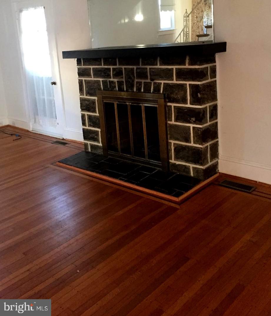 336 East Manoa Road Havertown, PA 19083 - Photo 7 of 23 an empty room with wooden floor
