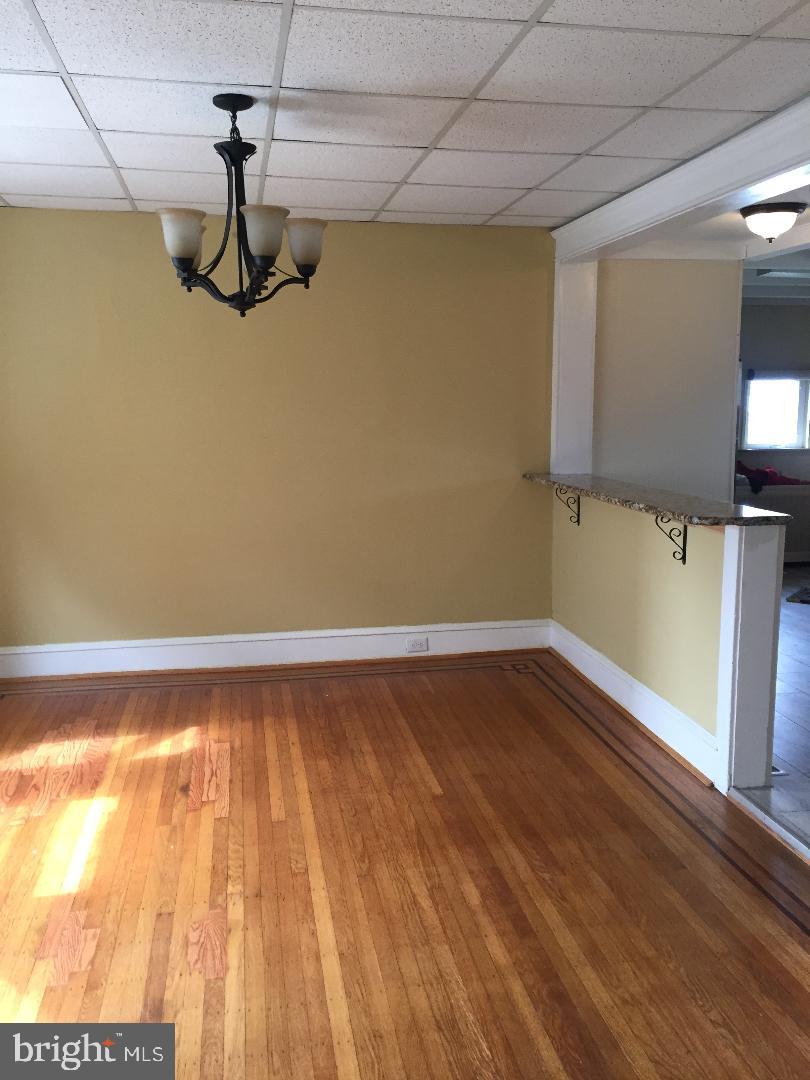 336 East Manoa Road Havertown, PA 19083 - Photo 8 of 23 a view of a room with wooden floor and roof