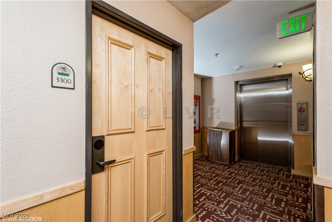 223 Hunter Ridge Drive, Unit 300 Brian Head, UT 84719 - Photo 3 of 48 Hallway with elevator