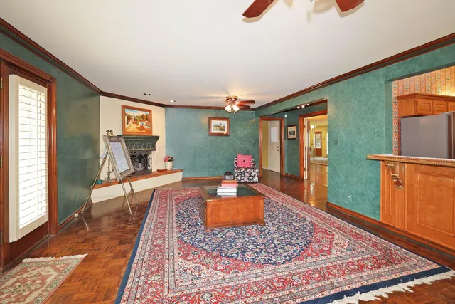 a living room with couch and a rug