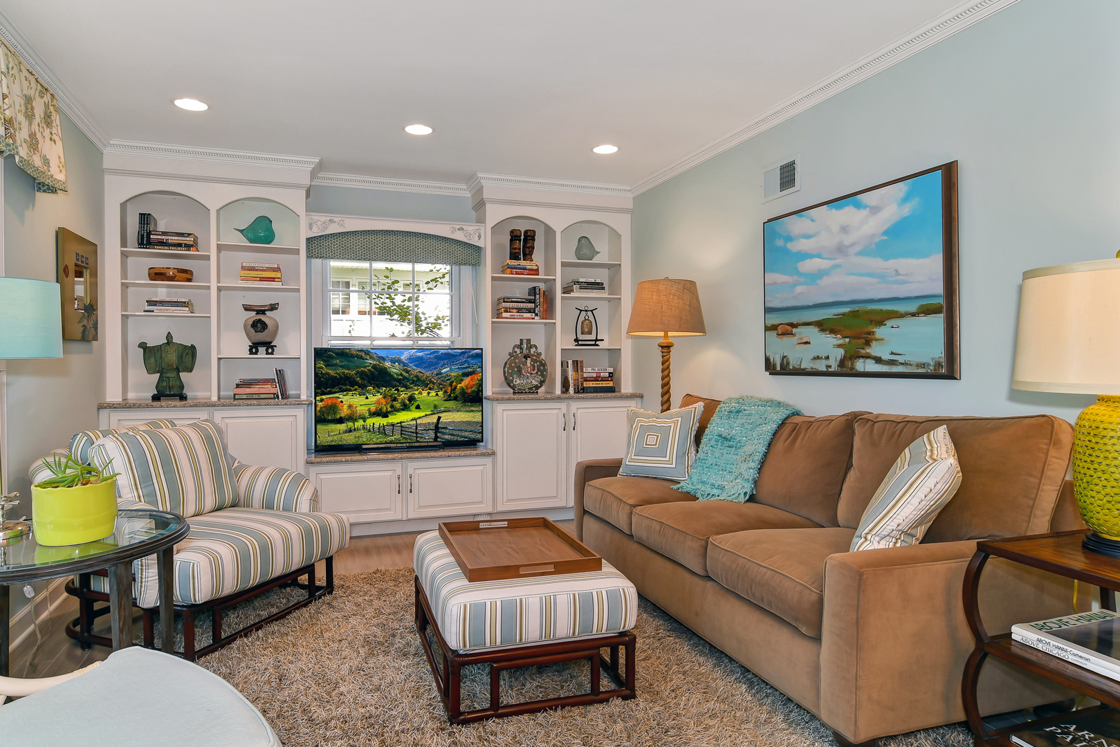 1124 Woodview Road Burr Ridge, IL 60527 - Photo 14 of 27 a living room with furniture and painting on the wall
