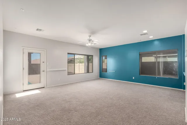 a view of a room that has a window