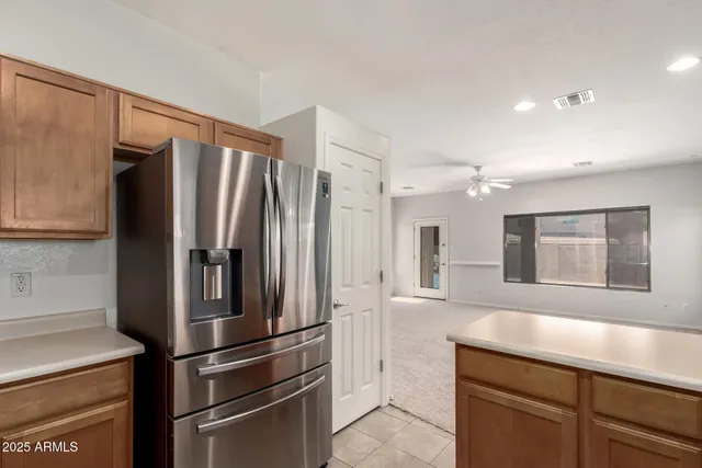 a view of a livingroom with a kitchen