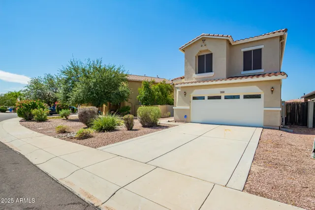 a front view of a house with yard