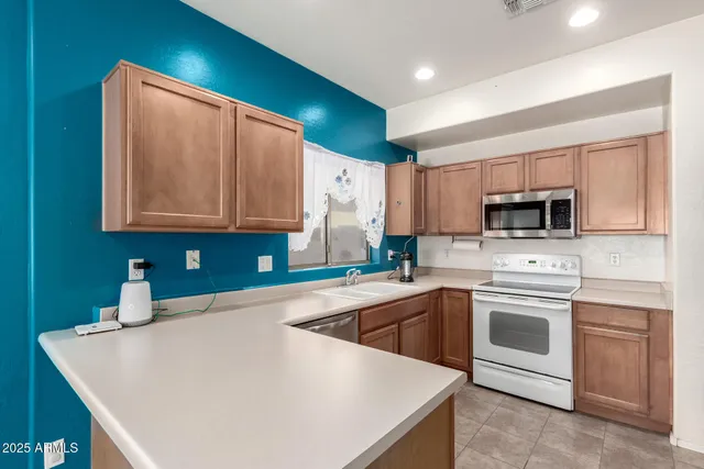 a view of an empty room with closet