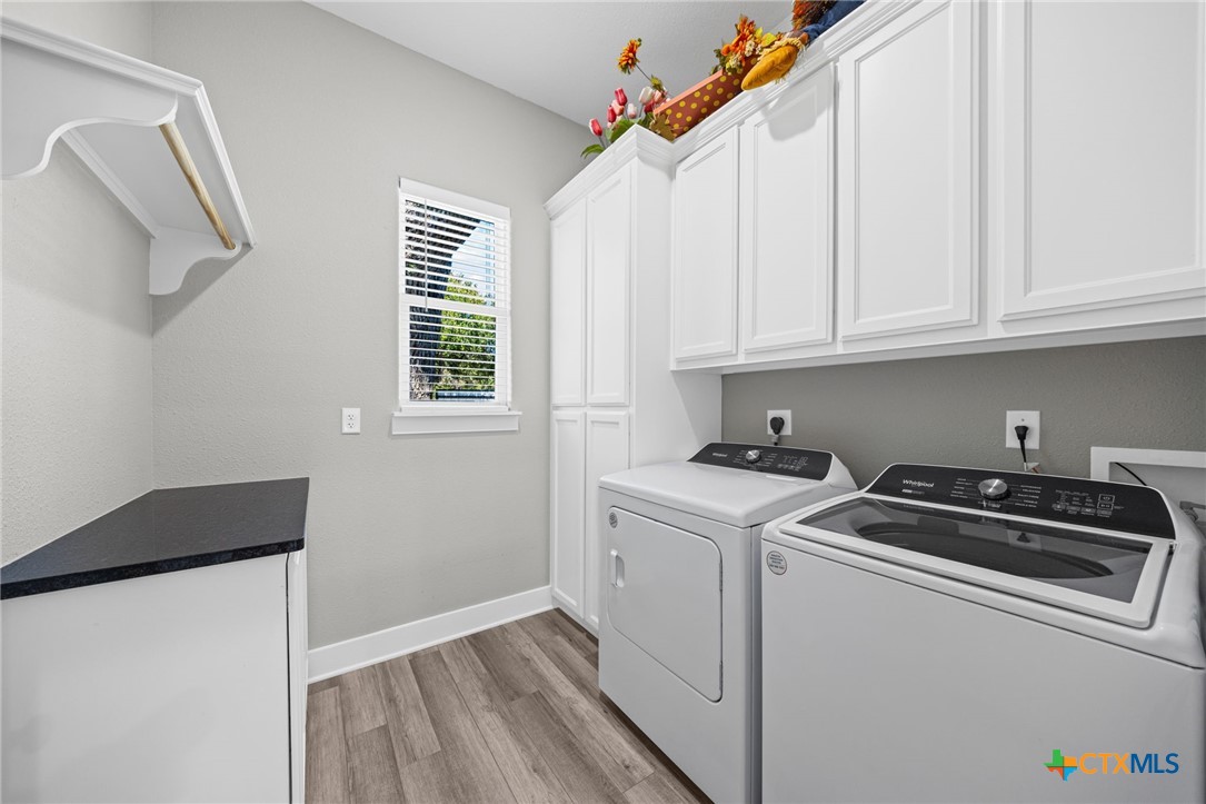28099 Fm 2670 Killeen, TX 76549 - Photo 8 of 48 a kitchen with a sink a stove and cabinets