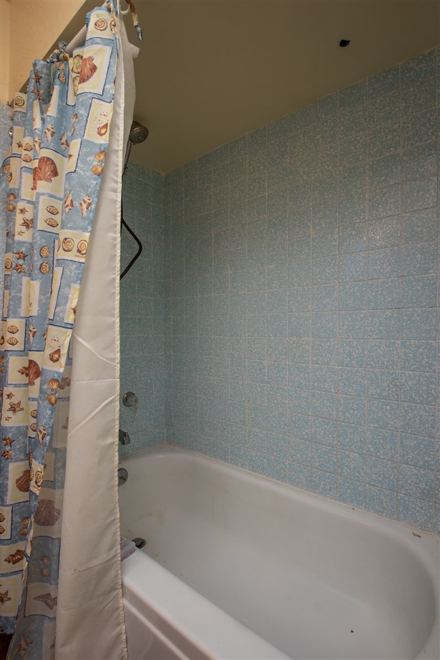 14500 Saunders Road Pecatonica, IL 61063 - Photo 14 of 19 a bathroom with a bathtub and shower