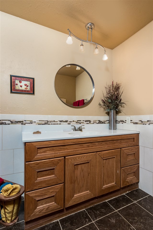 14500 Saunders Road Pecatonica, IL 61063 - Photo 15 of 19 a bathroom with a sink and a mirror