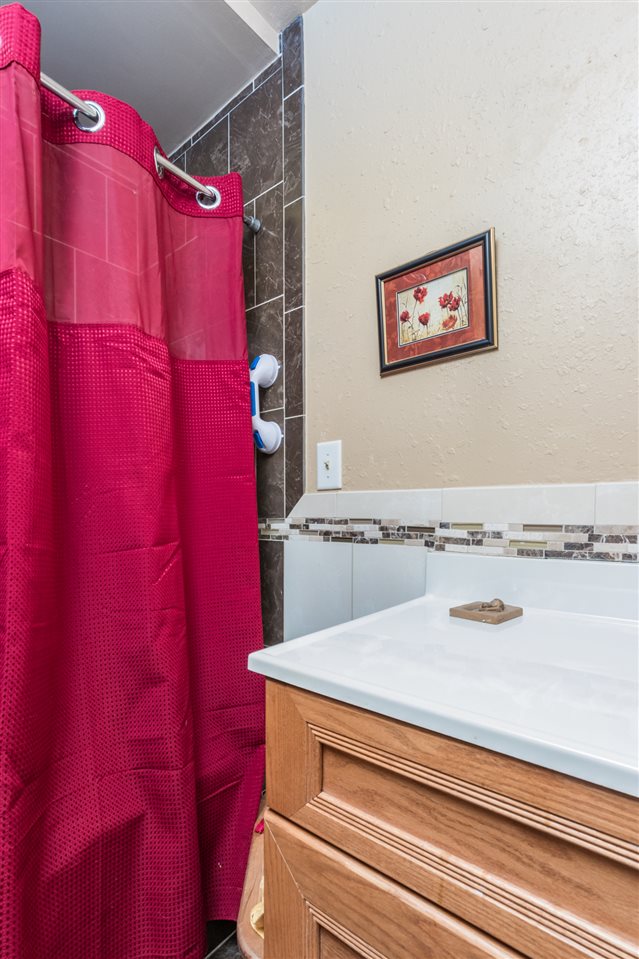 14500 Saunders Road Pecatonica, IL 61063 - Photo 16 of 19 a bathroom with a sink and a mirror