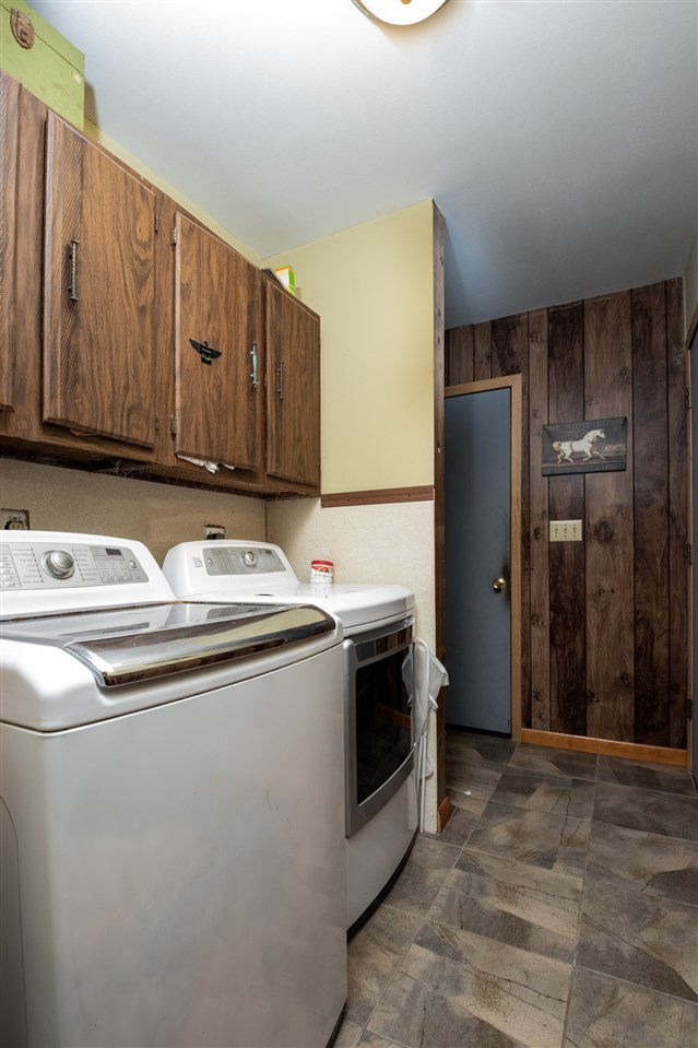 14500 Saunders Road Pecatonica, IL 61063 - Photo 17 of 19 a kitchen with stainless steel appliances granite countertop a sink a stove a refrigerator and cabinets