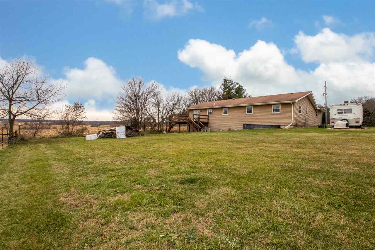 14500 Saunders Road Pecatonica, IL 61063 - Photo 19 of 19 a view of a houses with a yard