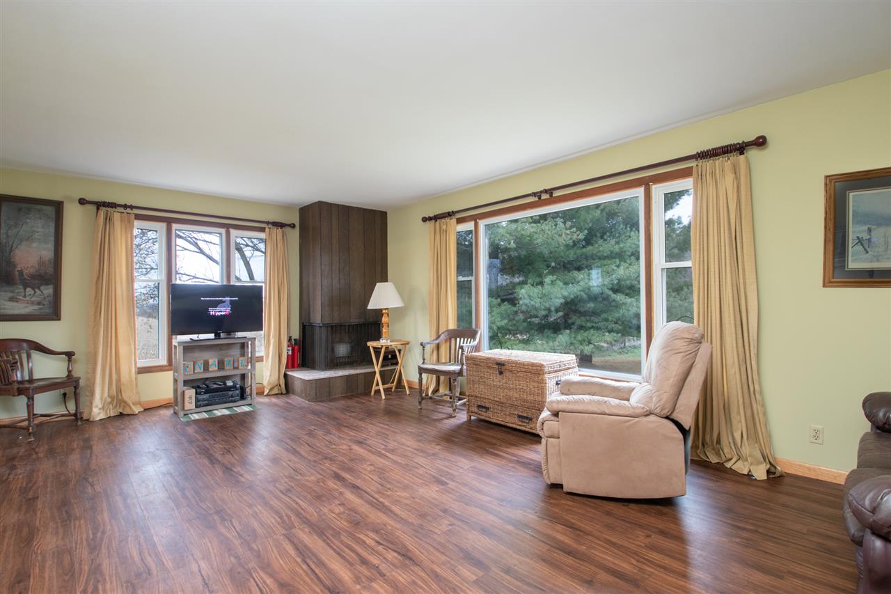 14500 Saunders Road Pecatonica, IL 61063 - Photo 5 of 19 a living room with furniture and a large window