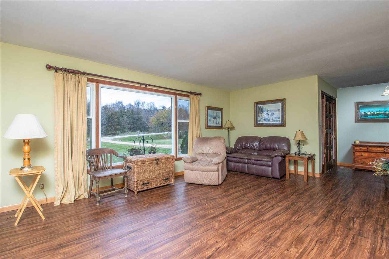 14500 Saunders Road Pecatonica, IL 61063 - Photo 6 of 19 a living room with furniture and a wooden floor