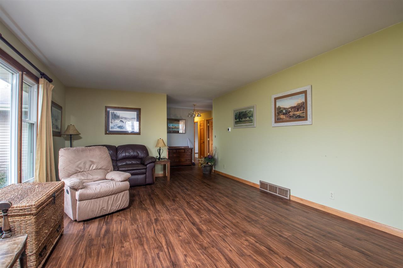 14500 Saunders Road Pecatonica, IL 61063 - Photo 7 of 19 a living room with couch and a wooden floor