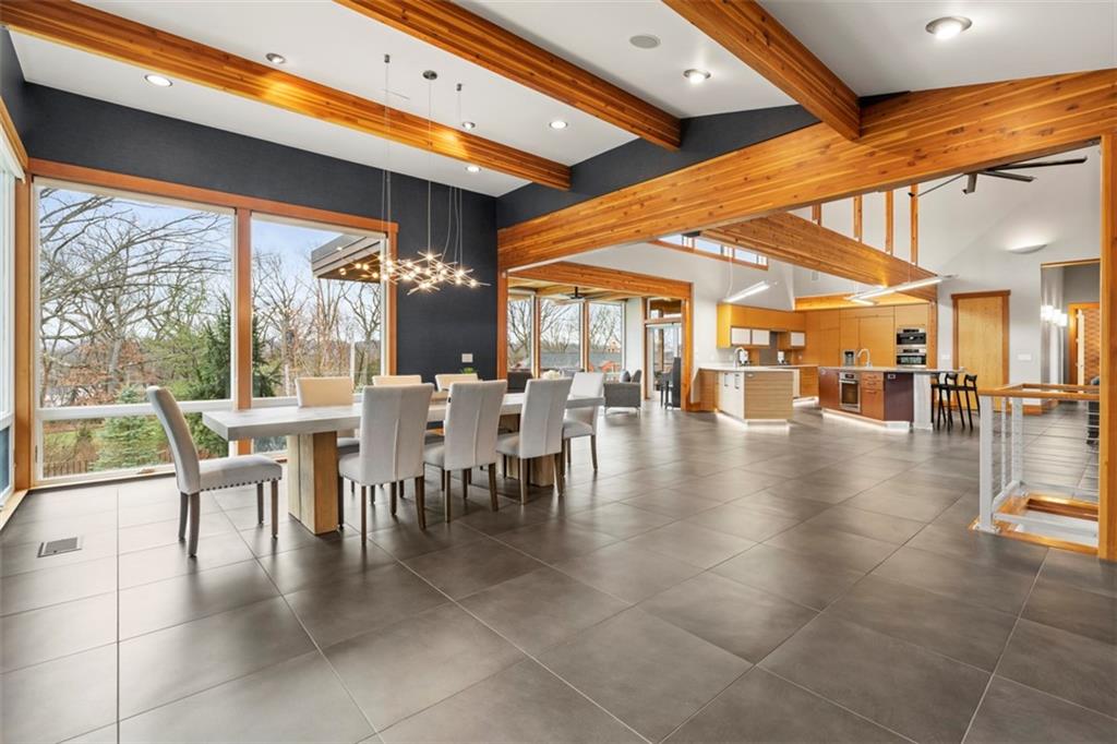 999 Elmhurst Road Pittsburgh, PA 15215 - Photo 5 of 49 The light filled dining area features beautiful beamed ceilings.