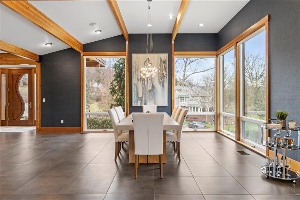 999 Elmhurst Road Pittsburgh, PA 15215 - Photo 6 of 49 The large windows let in natural light and the elevation still makes it a private setting inside.