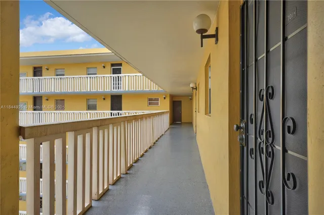 a view of livingroom with hardwood floor and hallway