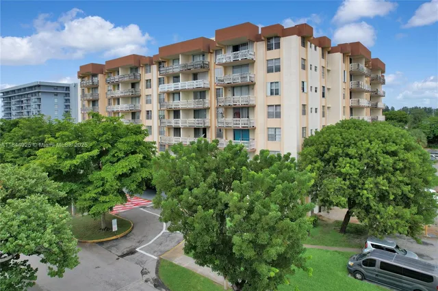 a view of a building and garden view