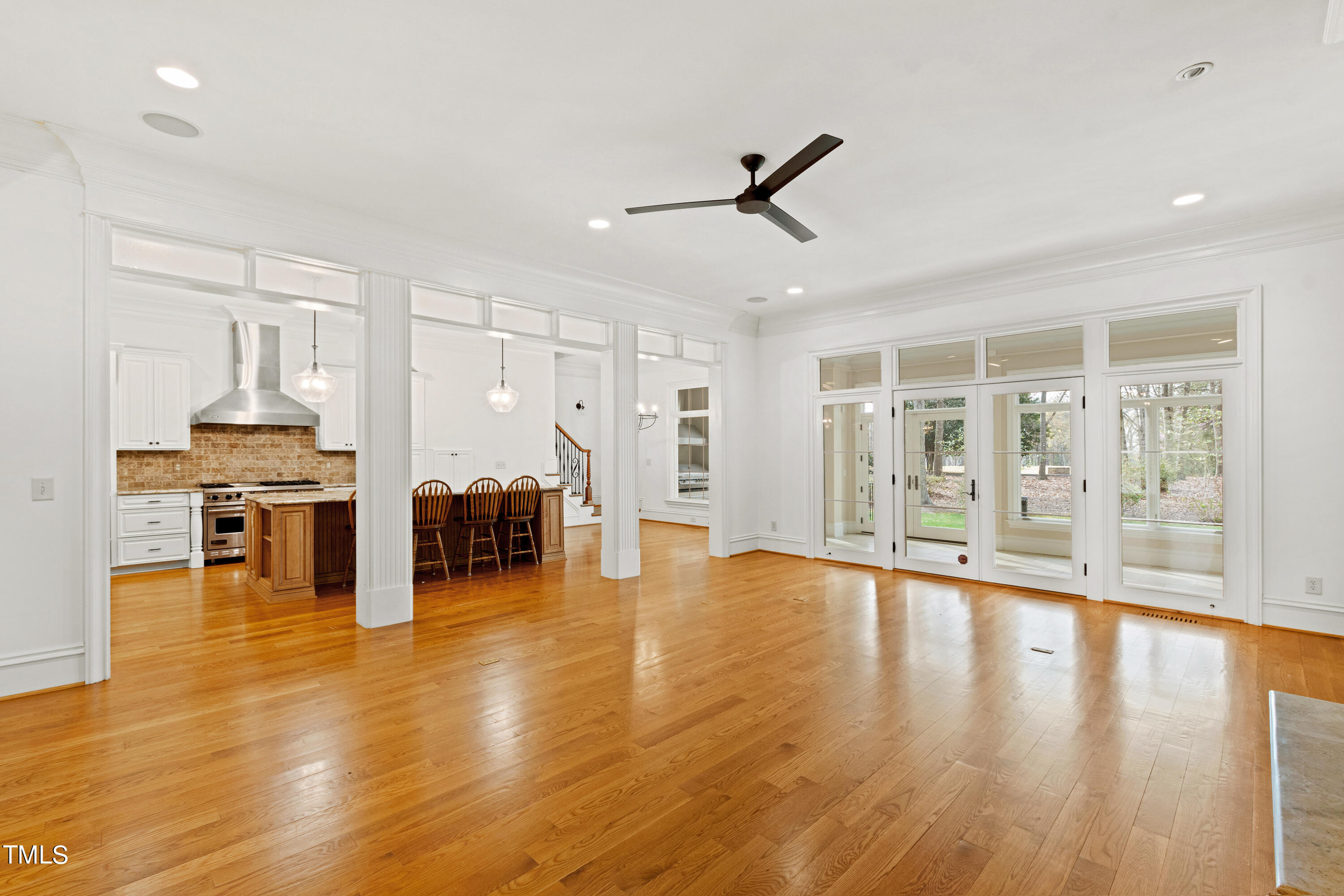 8108 Harps Mill Road Raleigh, NC 27615 - Photo 24 of 64 a living room with furniture and wooden floor