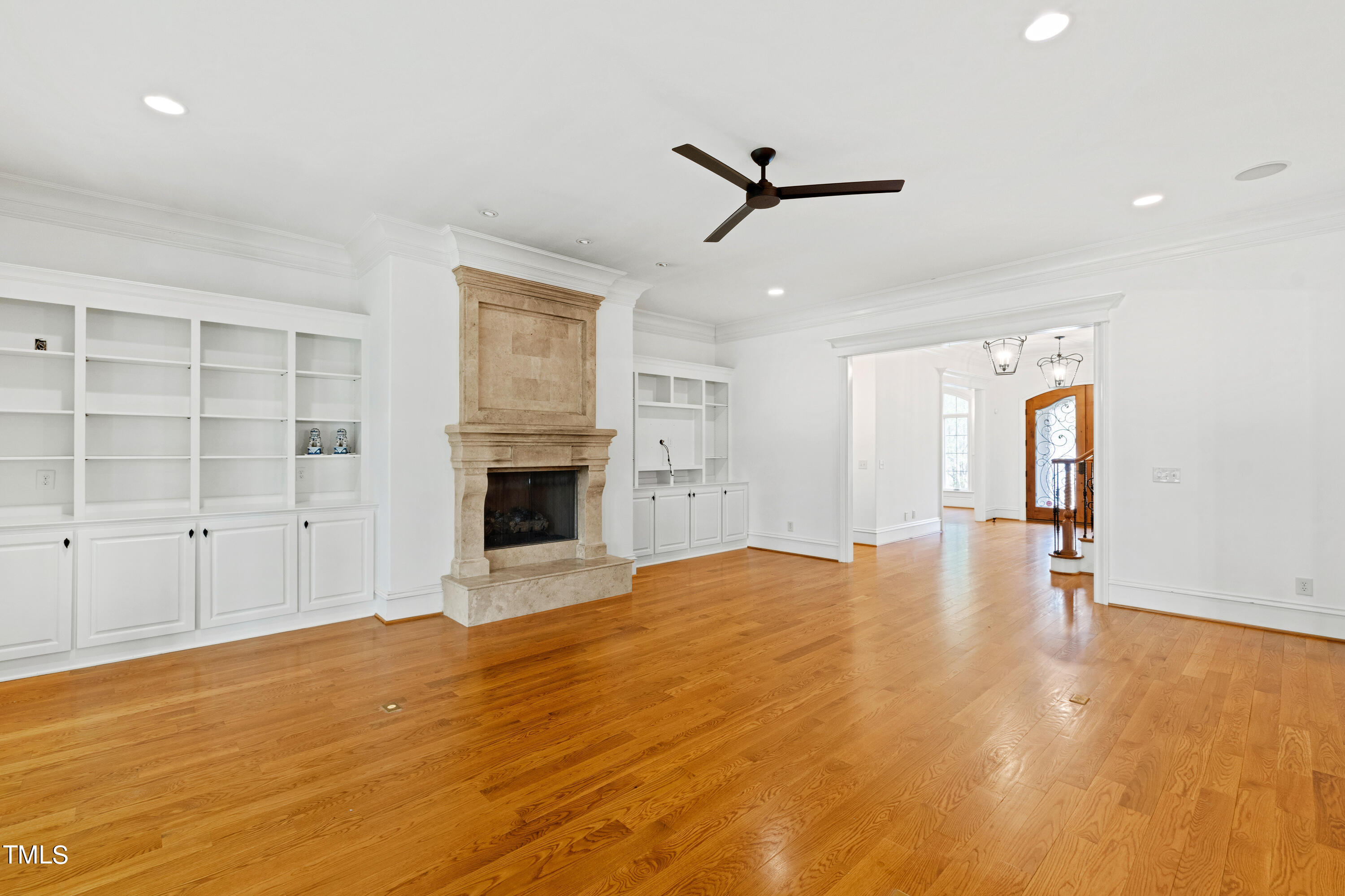 8108 Harps Mill Road Raleigh, NC 27615 - Photo 25 of 64 a view of empty room with wooden floor and window