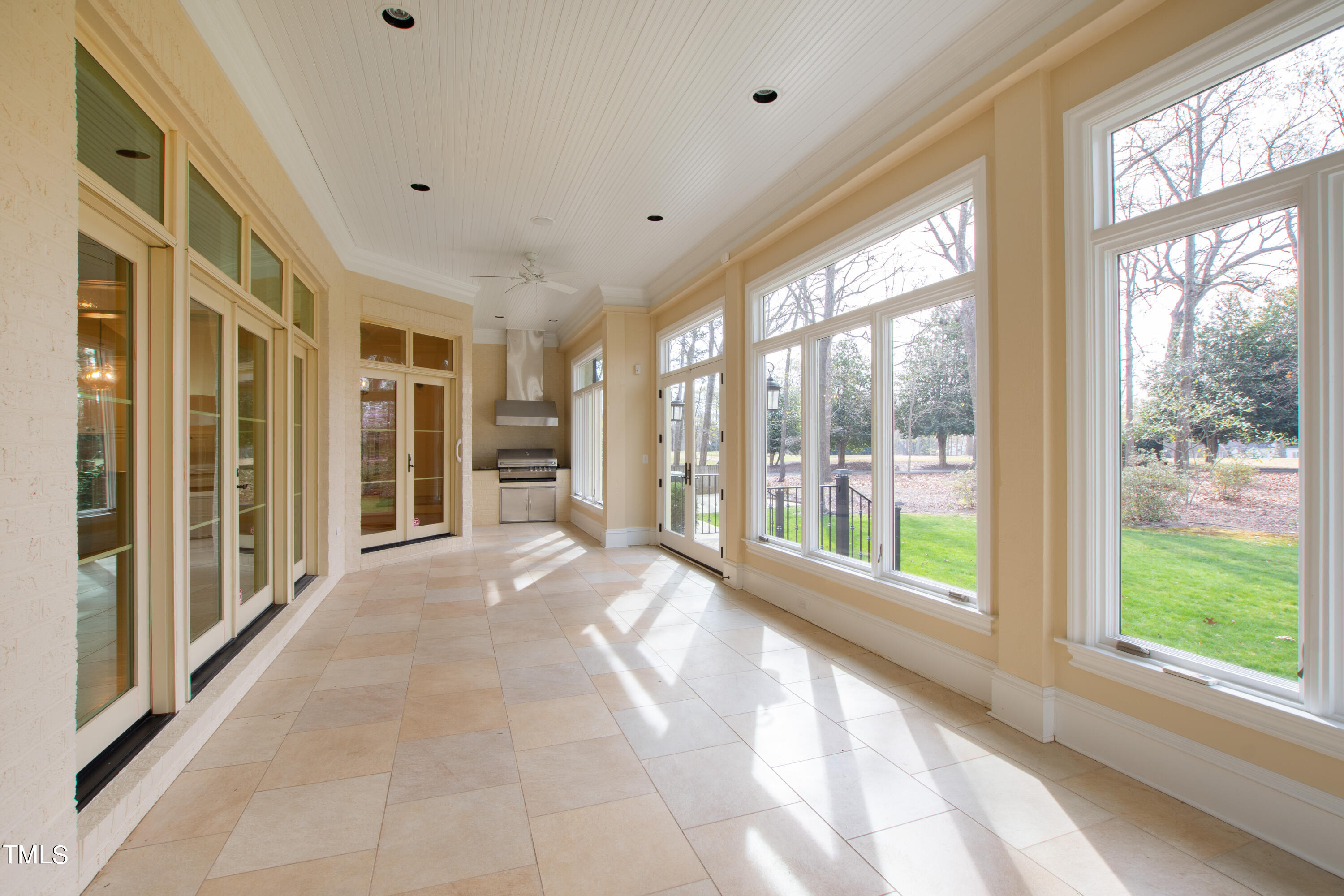 8108 Harps Mill Road Raleigh, NC 27615 - Photo 26 of 64 a view of an entryway with wooden floor and windows