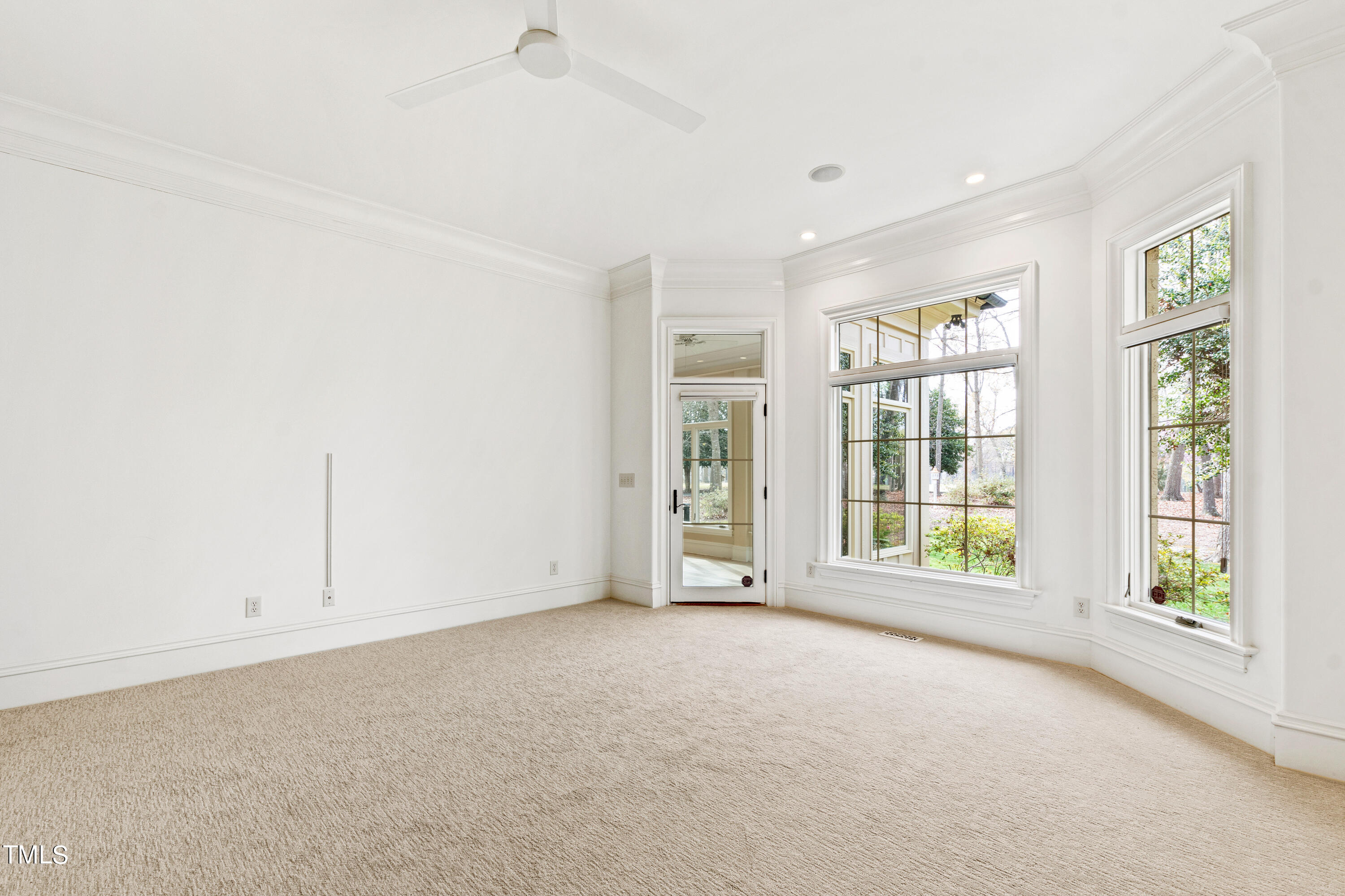 8108 Harps Mill Road Raleigh, NC 27615 - Photo 28 of 64 an empty room with windows and closet