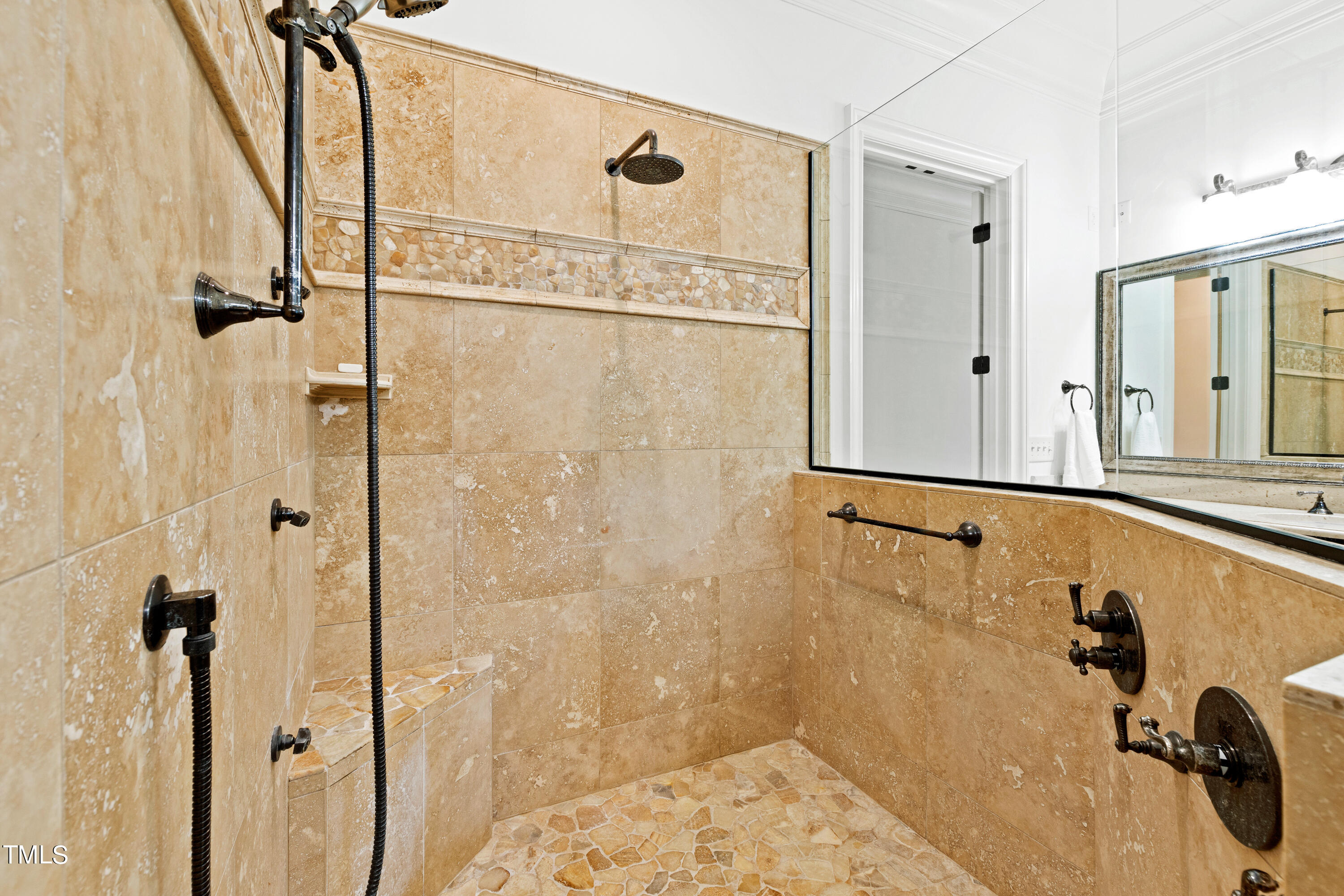 8108 Harps Mill Road Raleigh, NC 27615 - Photo 33 of 64 a bathroom with a shower