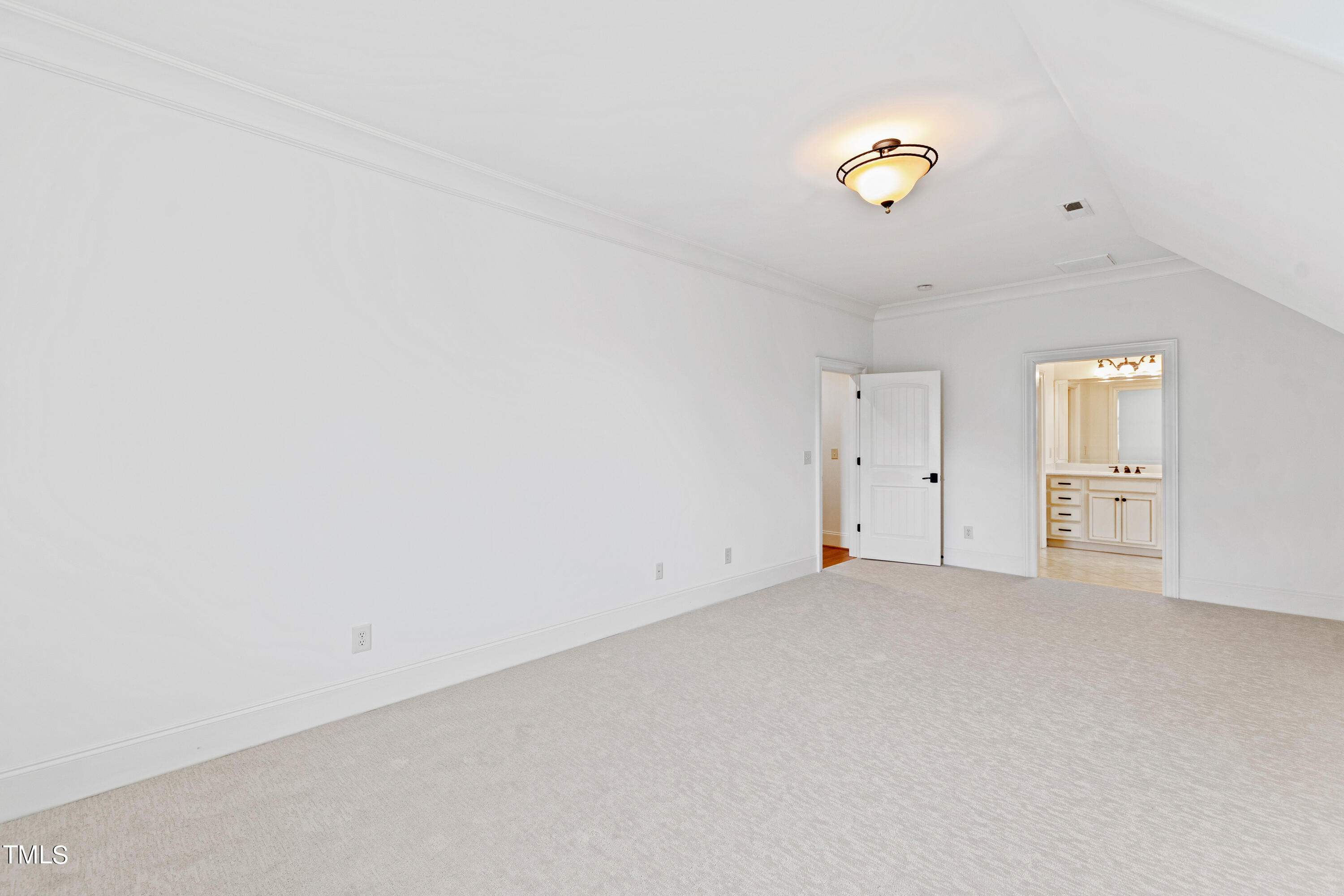 8108 Harps Mill Road Raleigh, NC 27615 - Photo 38 of 64 an empty room with windows