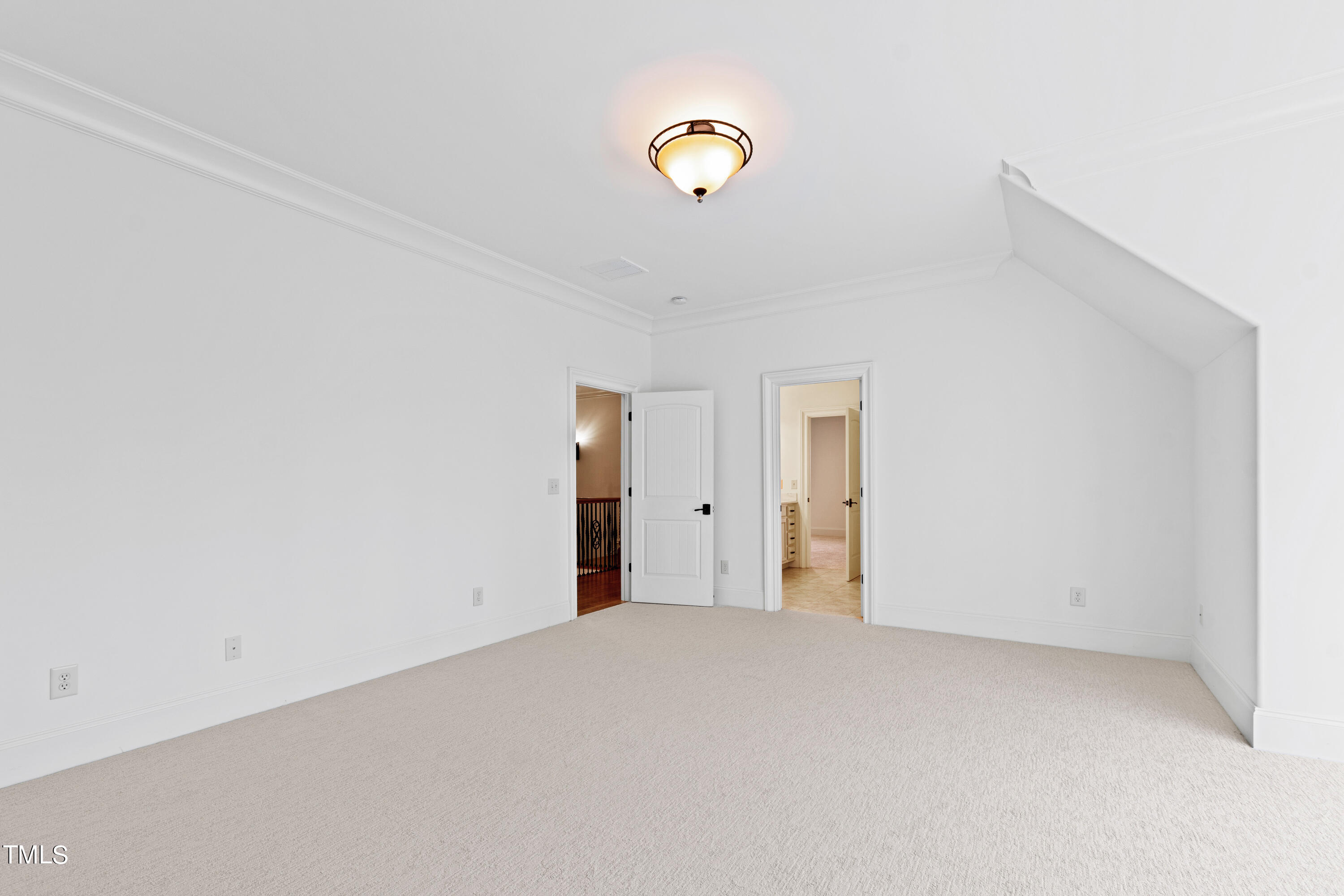 8108 Harps Mill Road Raleigh, NC 27615 - Photo 40 of 64 a view of a room with a fan