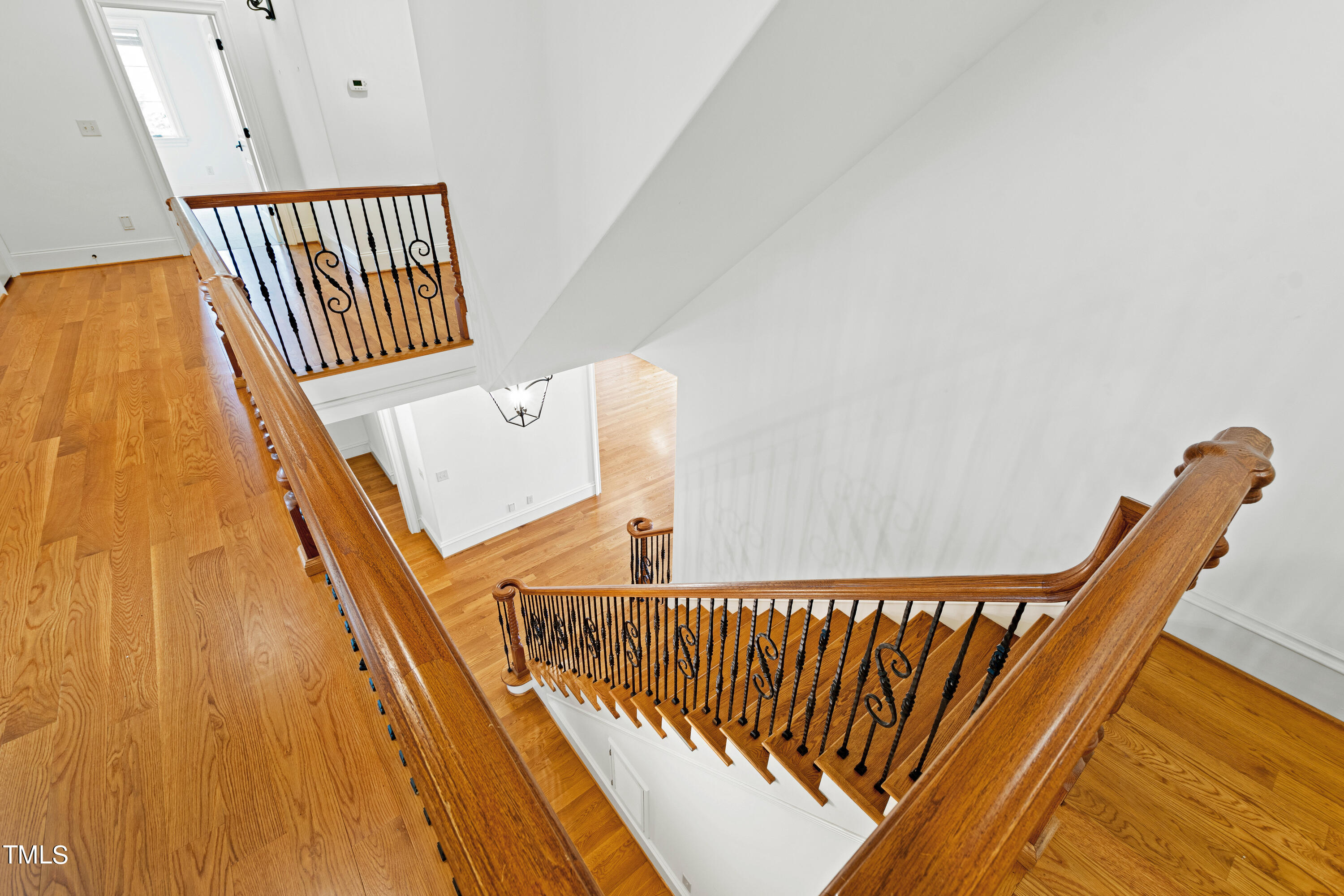 8108 Harps Mill Road Raleigh, NC 27615 - Photo 54 of 64 a view of stairs and hall